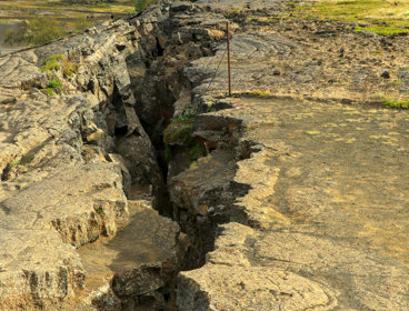 Deep earthquake fault across rocky ground