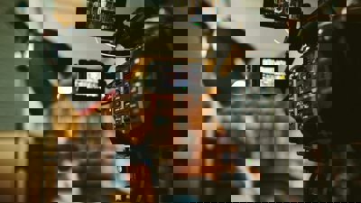 A blurred picture of a woman being interviewed