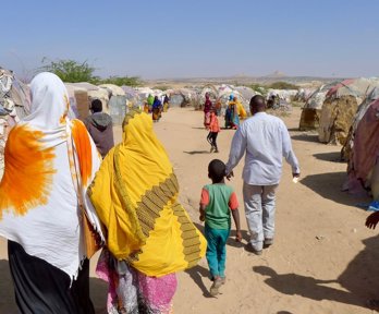 OCVP researchers and locals on a walk at Camp A
